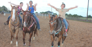 kids having fun on horses